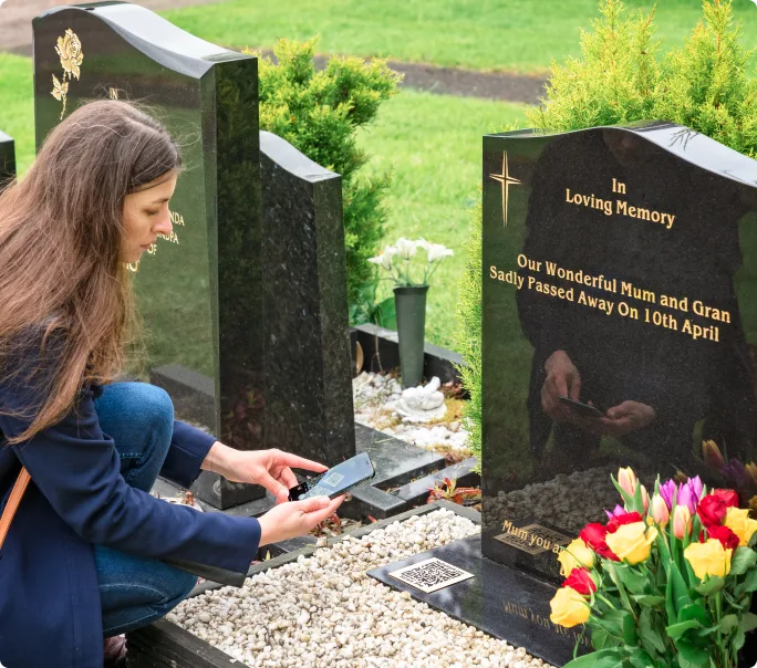 Scanning QR code at a graveside